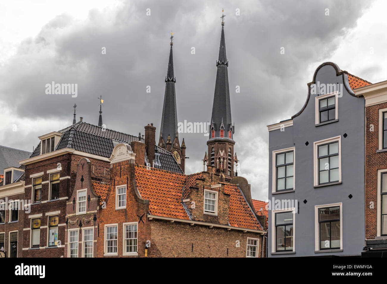 Gabled architecture along Market Square ( Markt ) and view on Maria van Jessekerk, Delft, South Holland, The Netherlands. Stock Photo