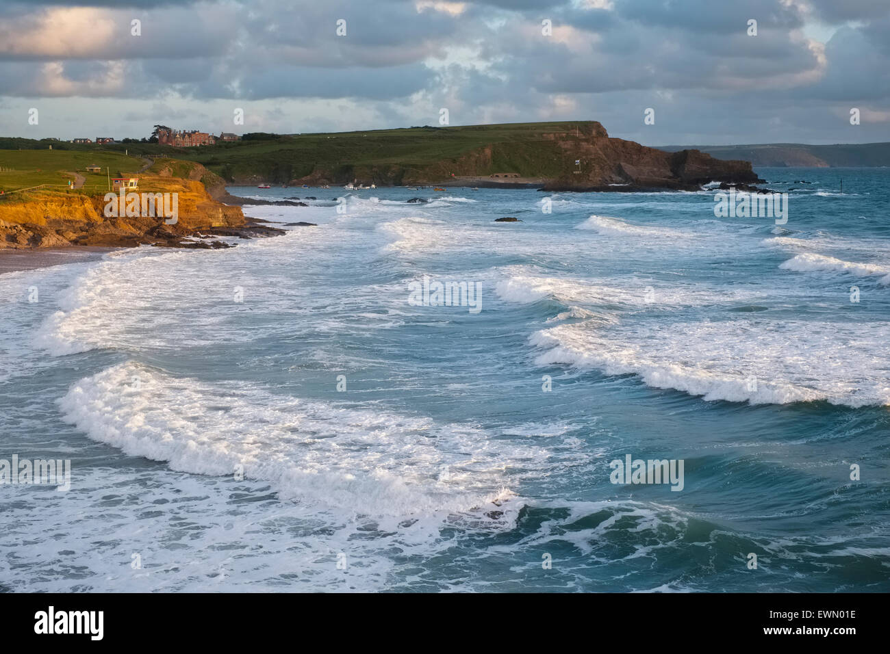 High tide at sunset on the Cornwall coast at Bude, England UK. Stock Photo