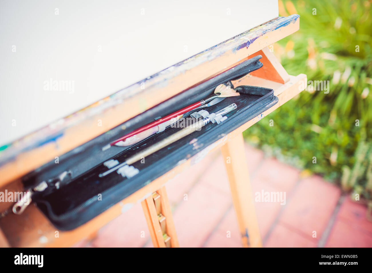 Easel and art supplies Stock Photo