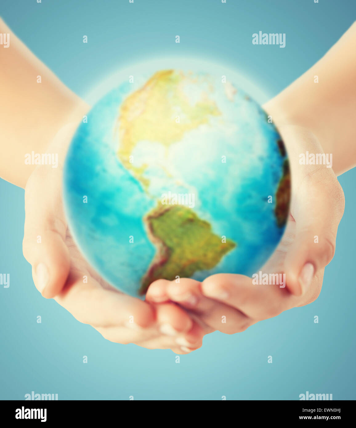 Planet earth and human hands hi-res stock photography and images - Alamy