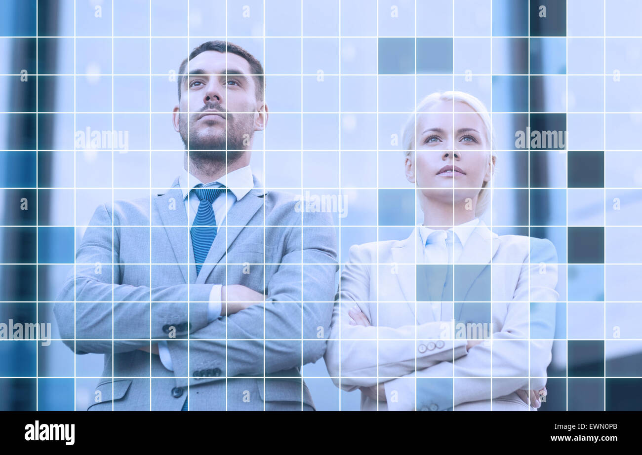 serious businessmen standing over office building Stock Photo - Alamy