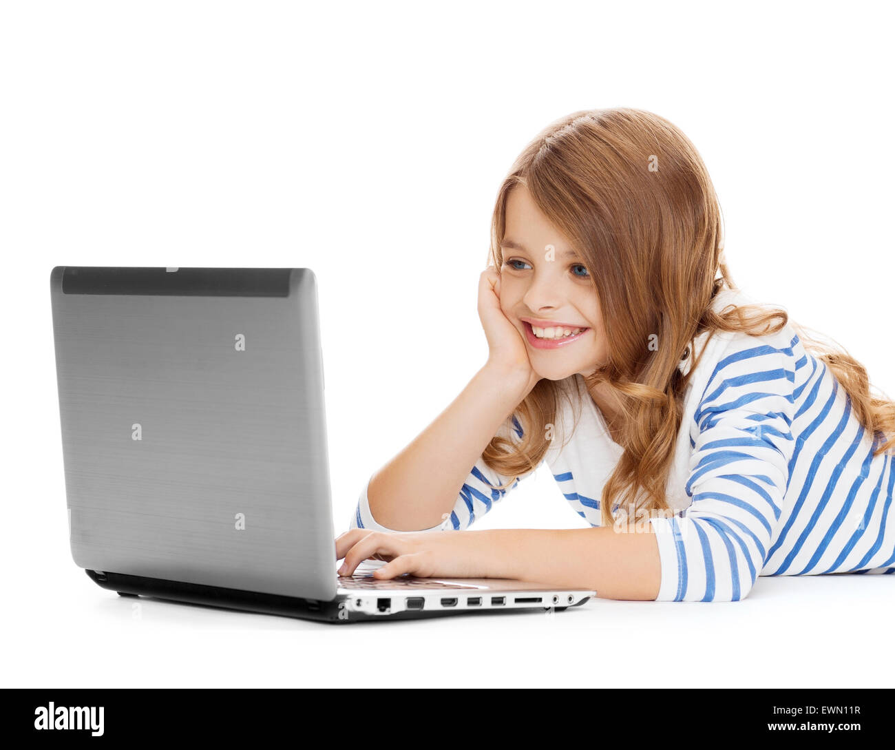 smiling student girl with laptop computer lying Stock Photo