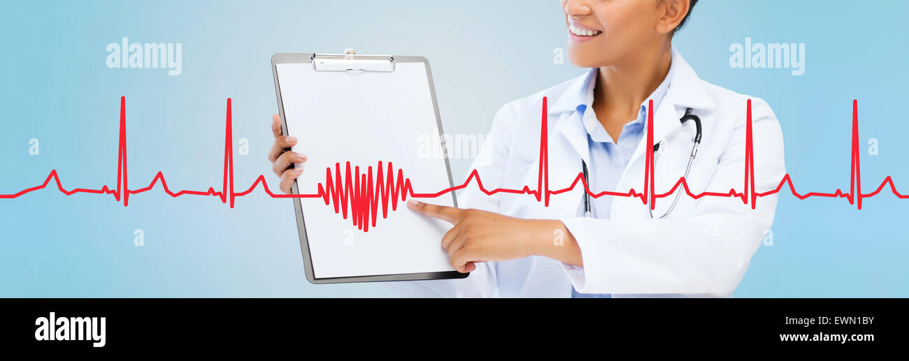 close up of smiling female doctor with clipboard Stock Photo - Alamy