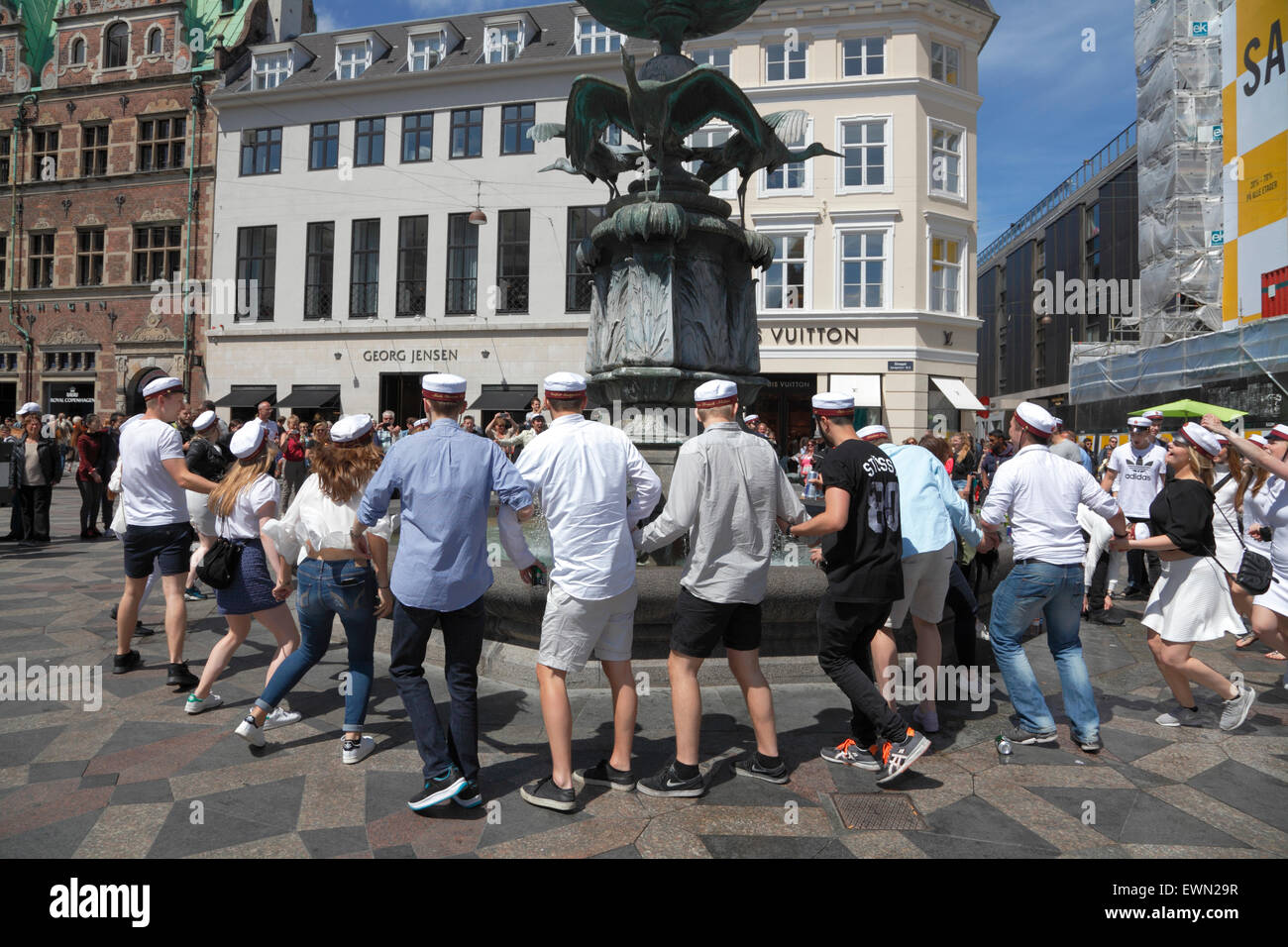 Danish high school students celebrate their graduation by the