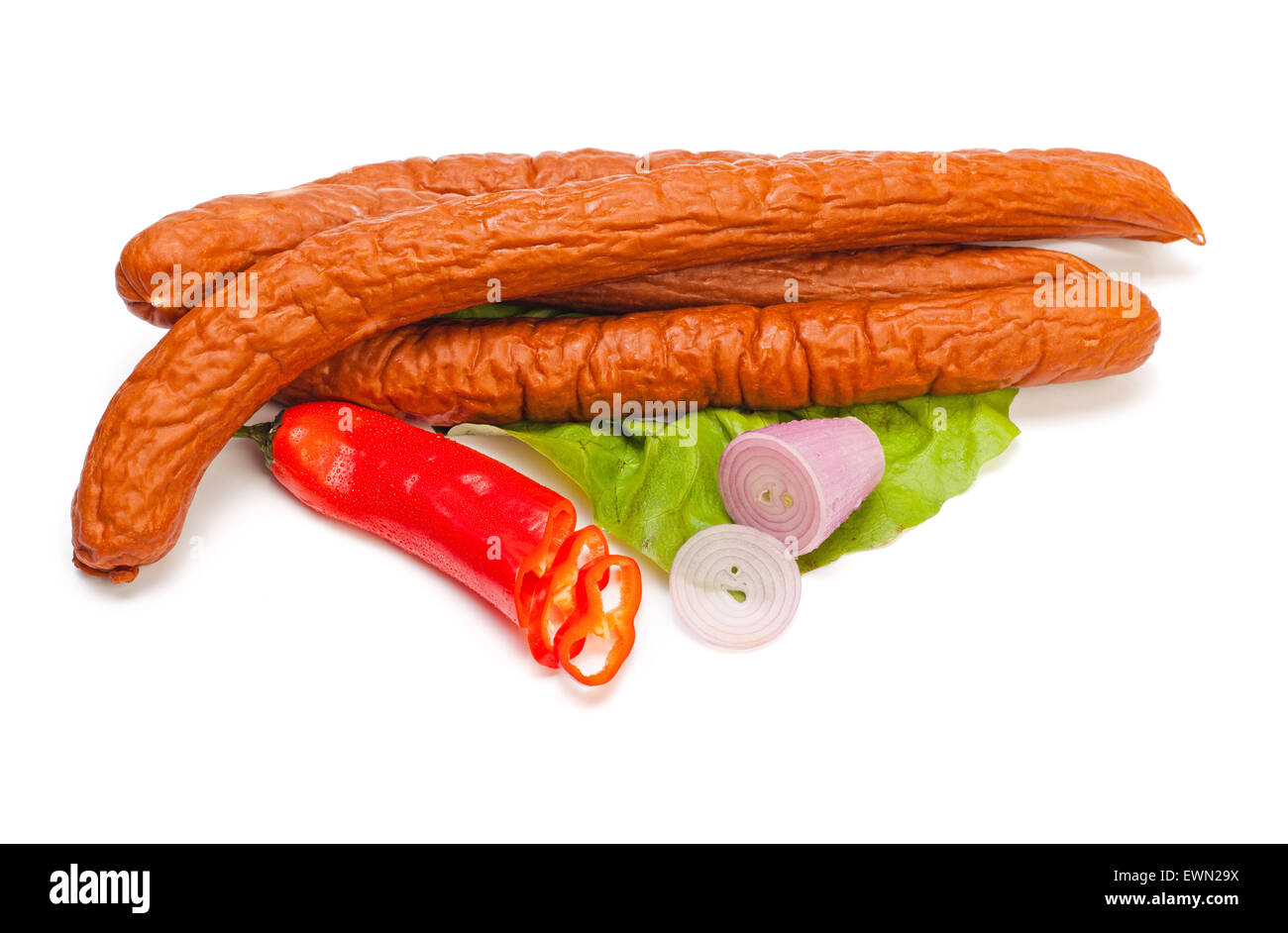 Turkey sausages on lettuce, pepper and onion decoration Stock Photo Alamy