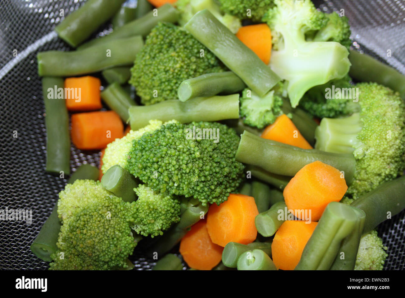 Mixed Vegetables boiled in a seive Stock Photo