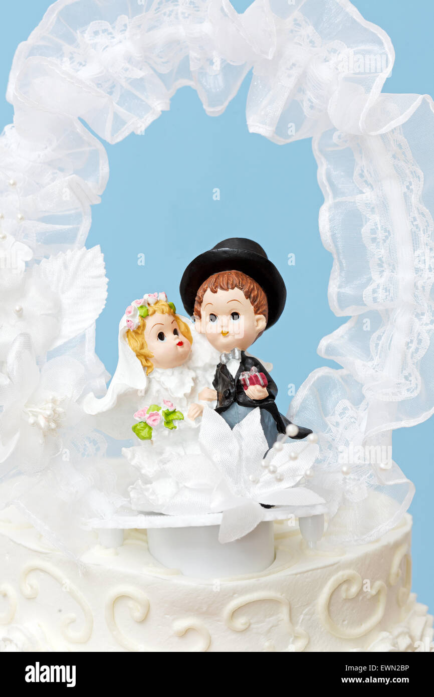 Close-up view of groom and bride cake topper Stock Photo - Alamy