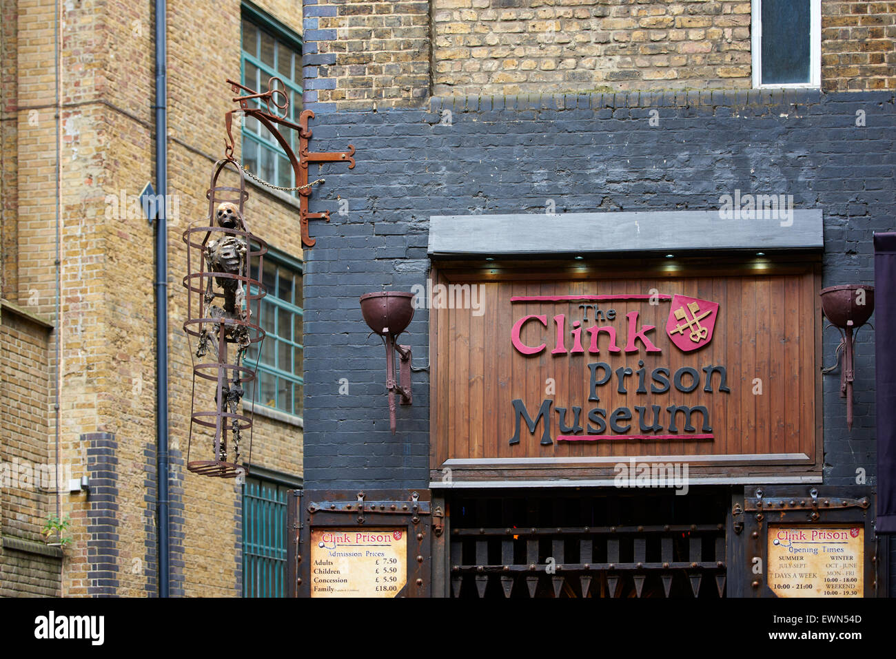 LONDON, UK - JUNE 23: Entrance to The Clink prison museum, which exhibits medieval torture tools, with replica of skeleton in ca Stock Photo