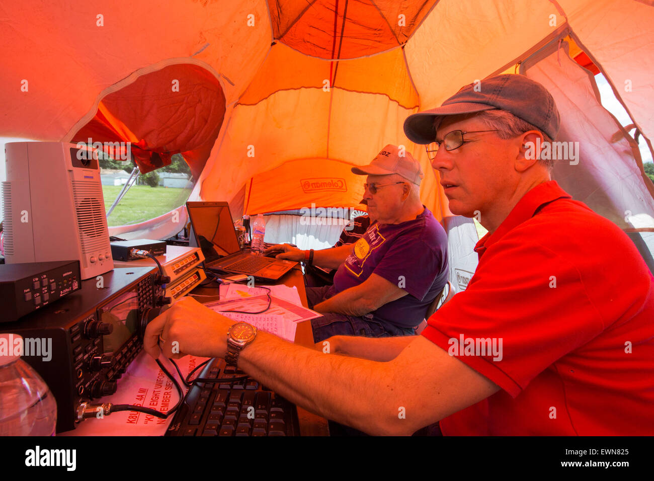 Livonia, Michigan - Working in a tent, amateur radio operators participate in the American Radio Relay League's annual field day Stock Photo