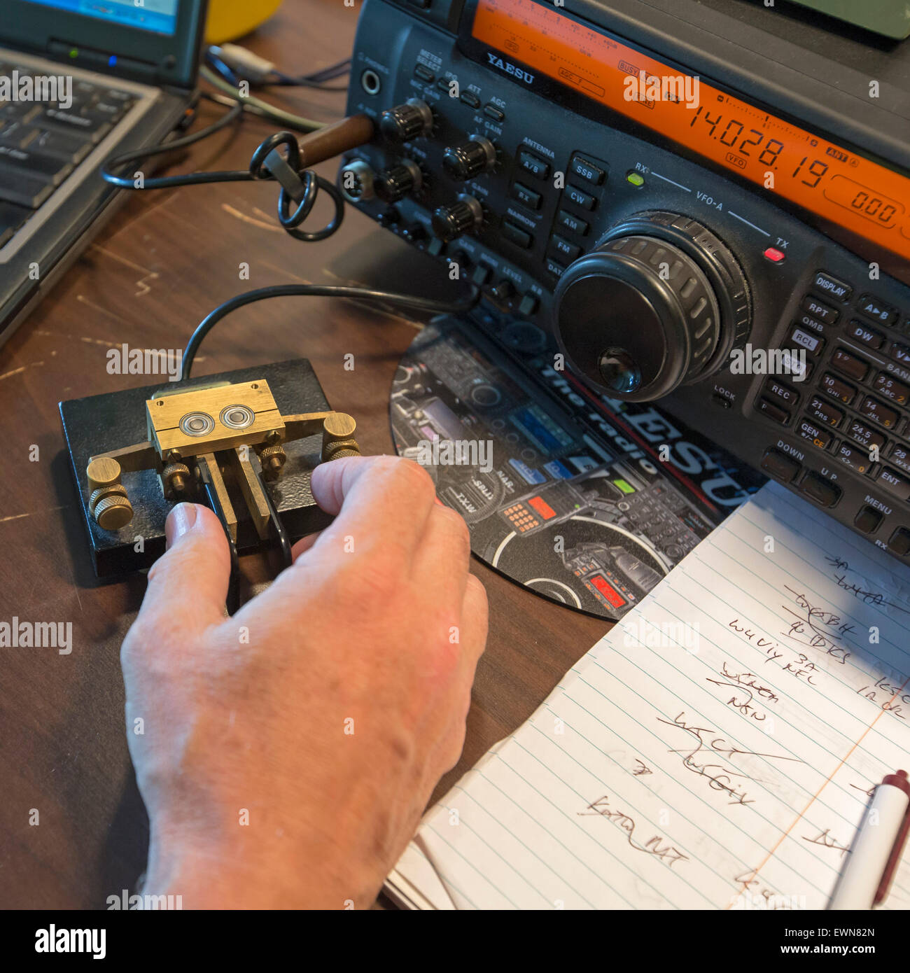 Livonia, Michigan - An amateur radio operator uses a Morse code keyer. Stock Photo