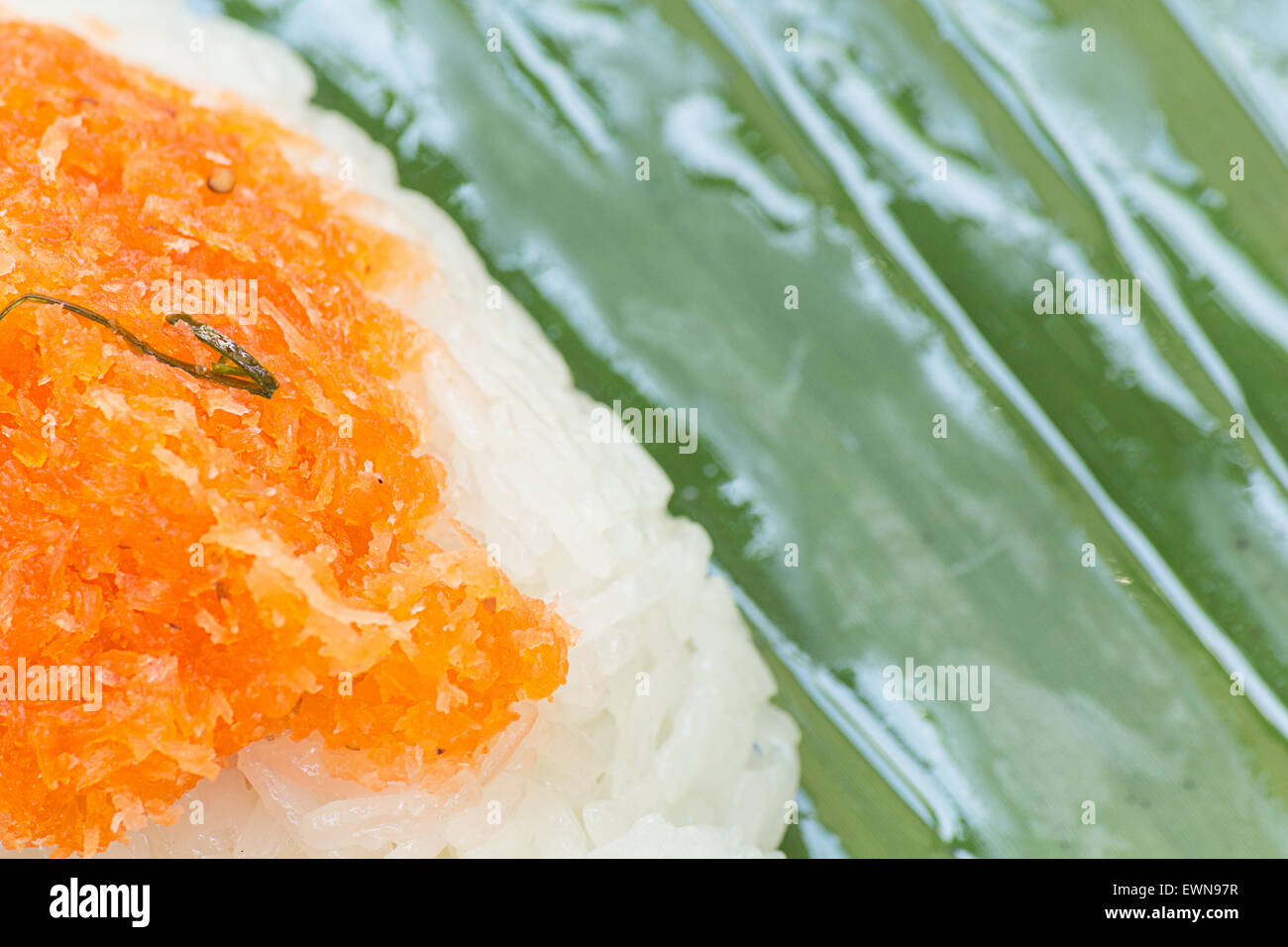 Sticky rice with Shrimp and shred coconut , wrapped in banana Stock Photo