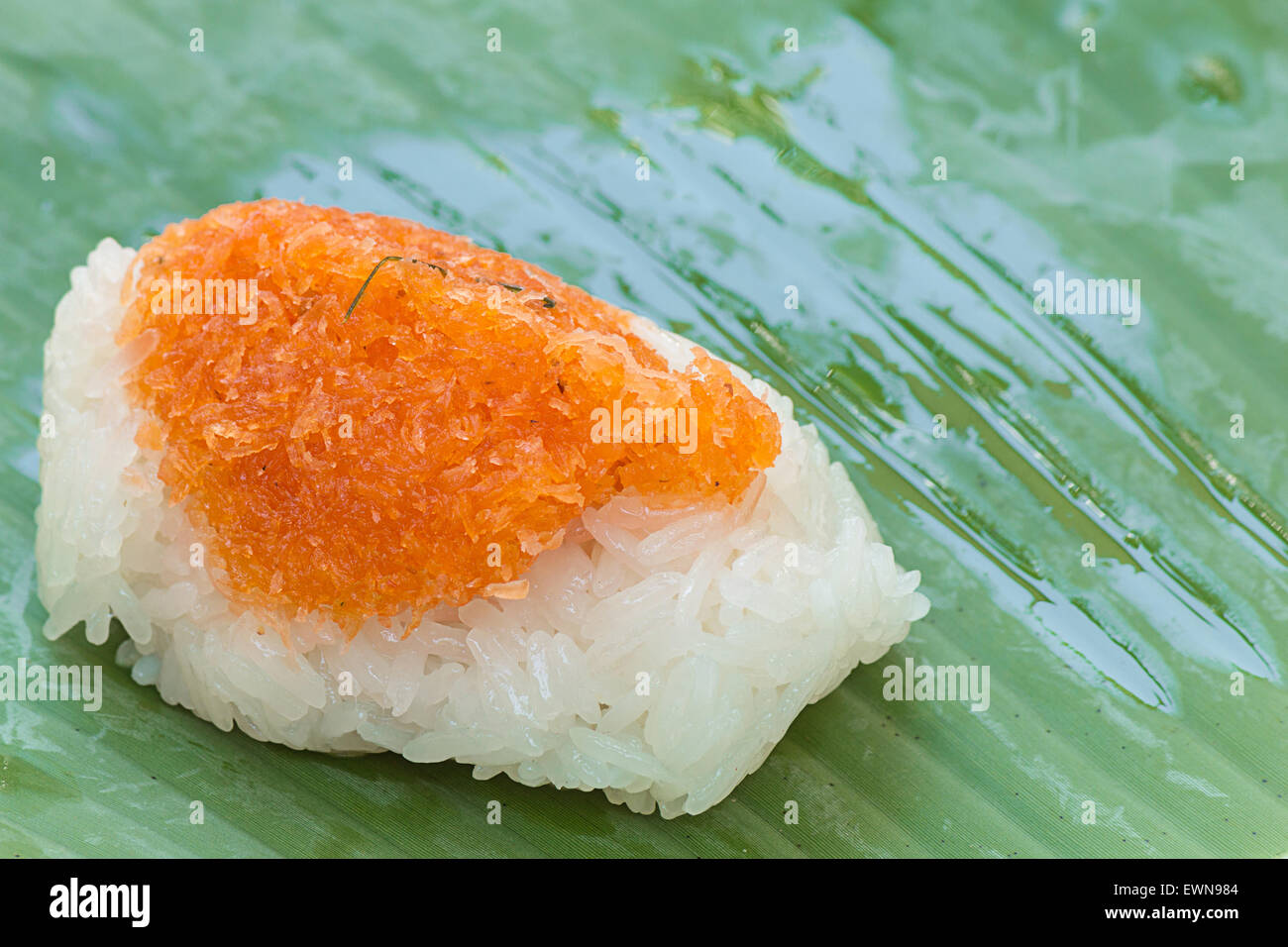 Sticky rice with Shrimp and shred coconut , wrapped in banana Stock Photo