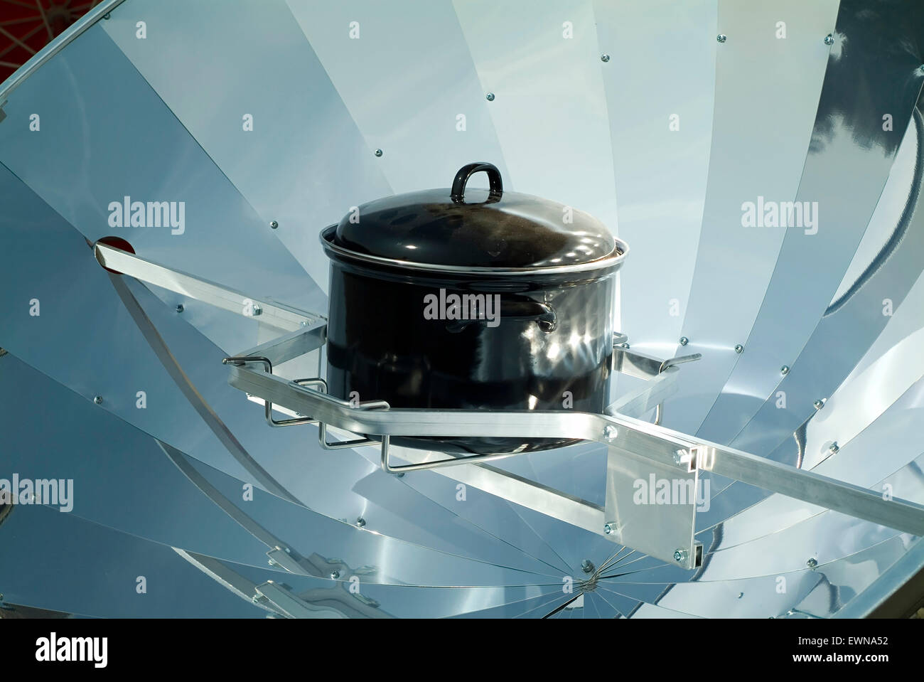 Solar cooker with black saucepan Stock Photo