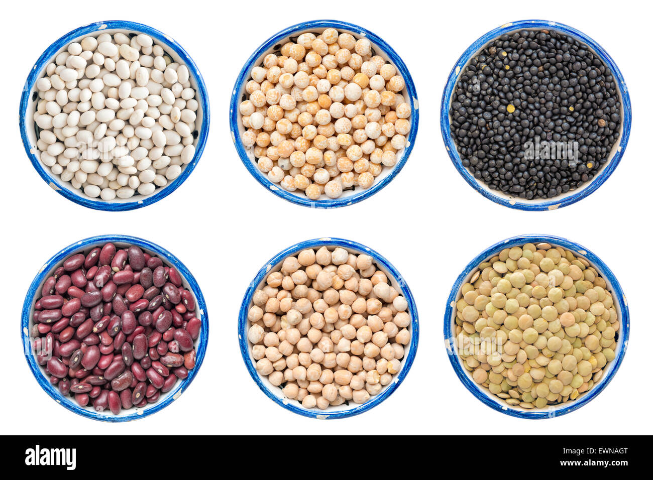 different kind of dry legume beans - white and red kidney, pea and chickpea, black and green lentils isolated on white Stock Photo