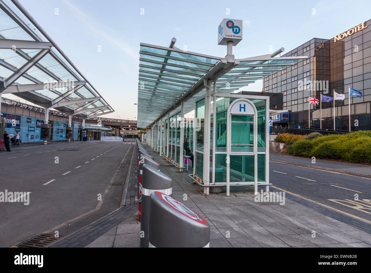 Local buses' bus stop outside the arrivals lounge of Birmingham Stock Photo  - Alamy