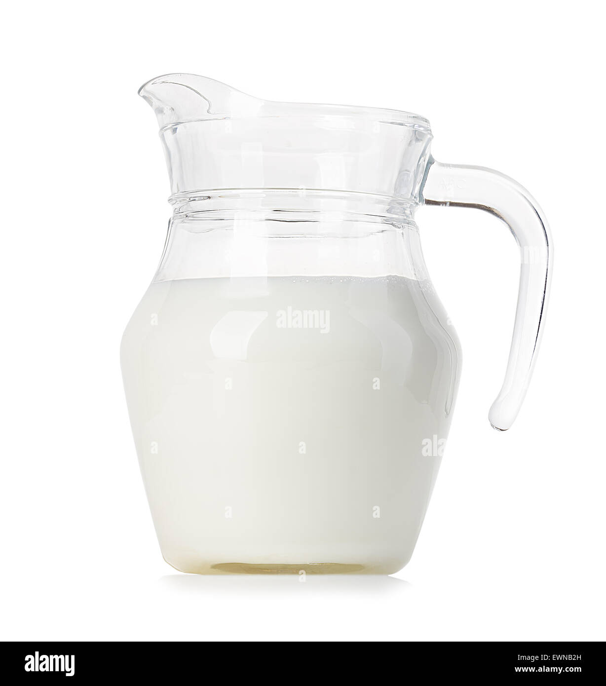 Glass jug of fresh milk isolated on white background Stock Photo