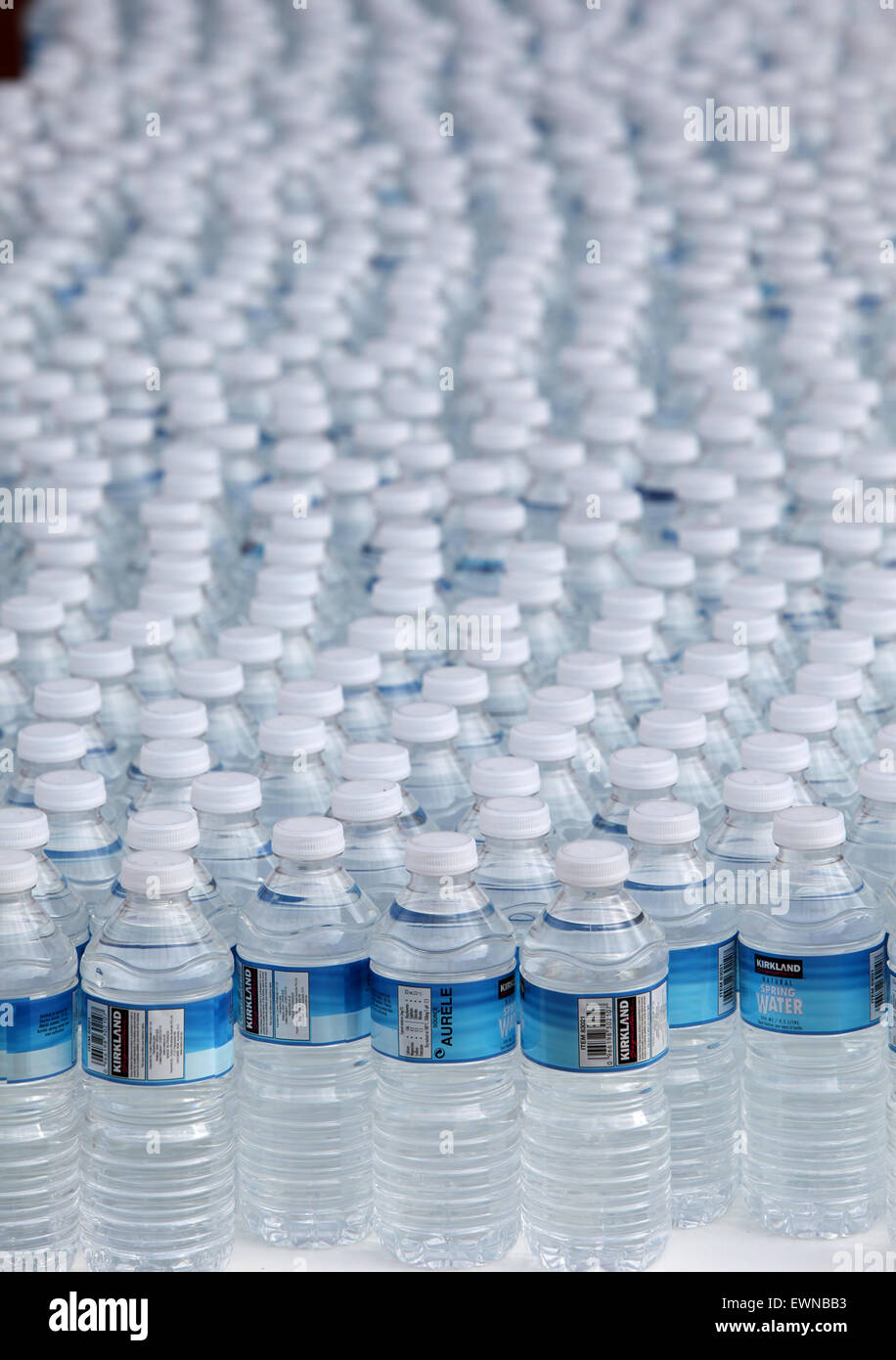 https://c8.alamy.com/comp/EWNBB3/rows-of-plastic-bottles-of-drinking-water-EWNBB3.jpg
