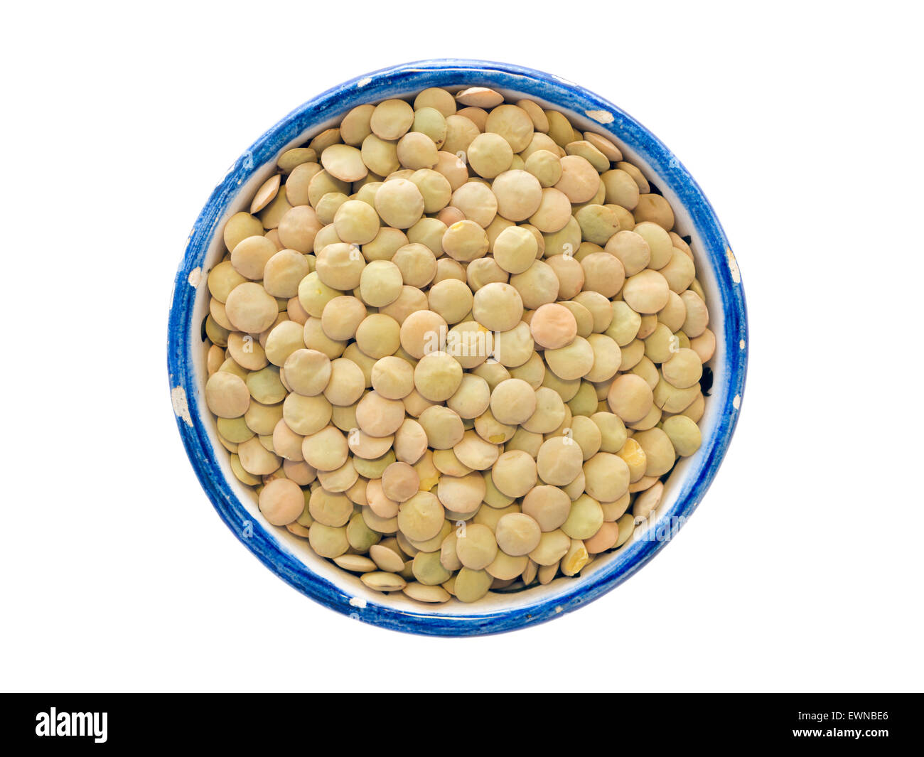 many green lentil beans in small blue cup isolated on white Stock Photo