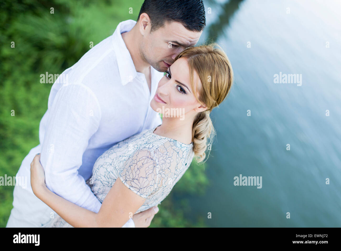 Young couple by the river Stock Photo