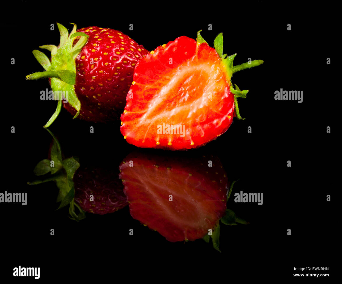 Strawberry cut in half hi-res stock photography and images - Alamy