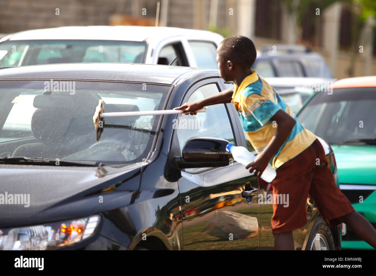 Teenager washing car hires stock photography and images Alamy