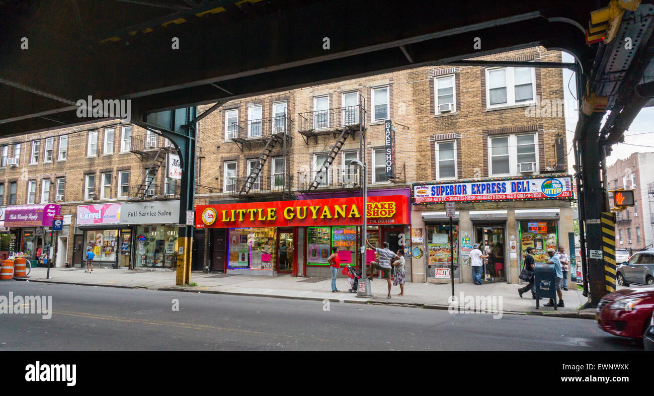 Little Guyana Bake Shop under the elevated train in Richmond Hill in the New York borough of Queens on Thursday, June 25, 2015. The neighborhood of Richmond Hill is a polyglot of ethnic cultures. It is home to Pakistanis, Indians, Guyanese and has a large Sikh population.  (© Richard B. Levine) Stock Photo