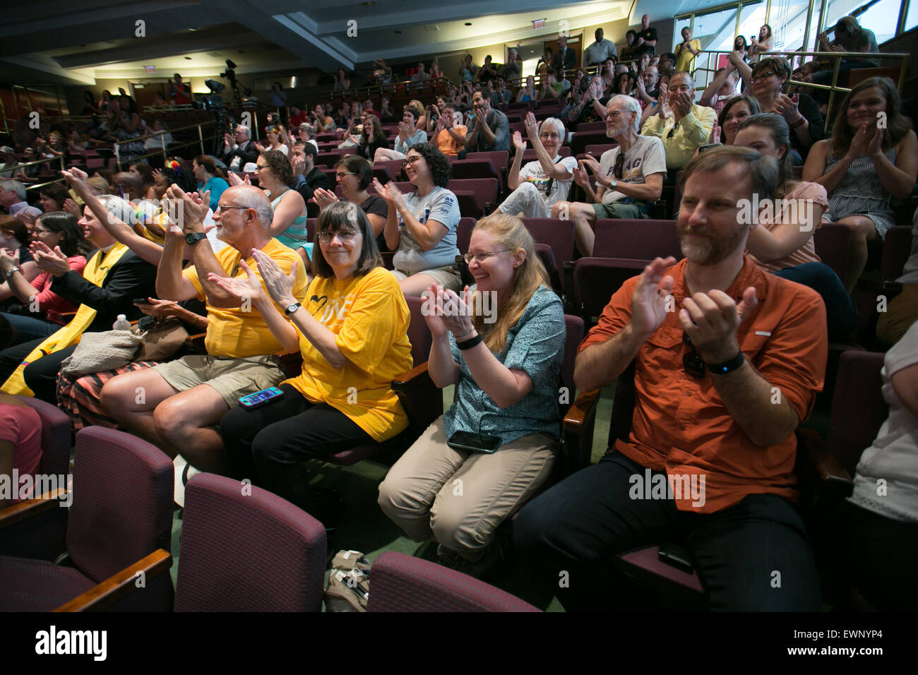 The crowd responds to couples getting married in Georgia on June 26, 2016. Stock Photo