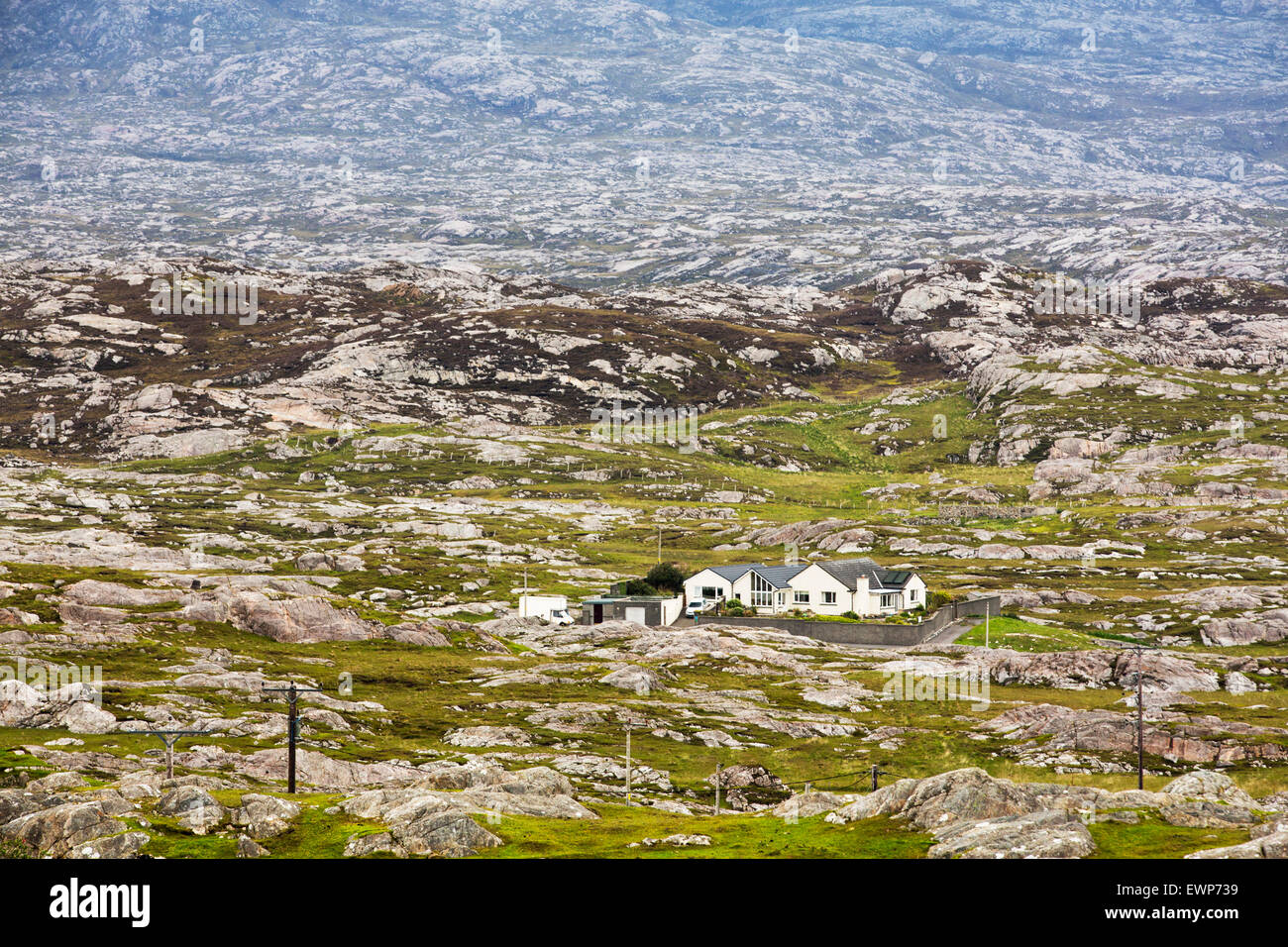 Barren, rugged scenery on the Golden Road on the East side of the Isle of Harris, Outer Hebrides, Scotland, UK. Stock Photo