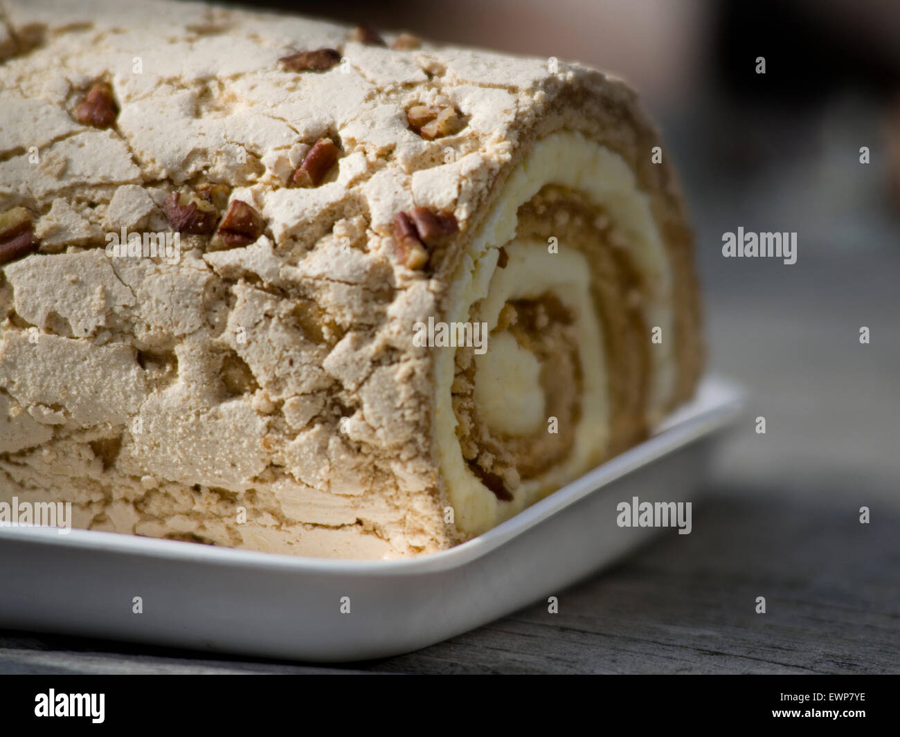 Toffee pecan roulade. Meringue, cream, toffee and pecan nuts dessert