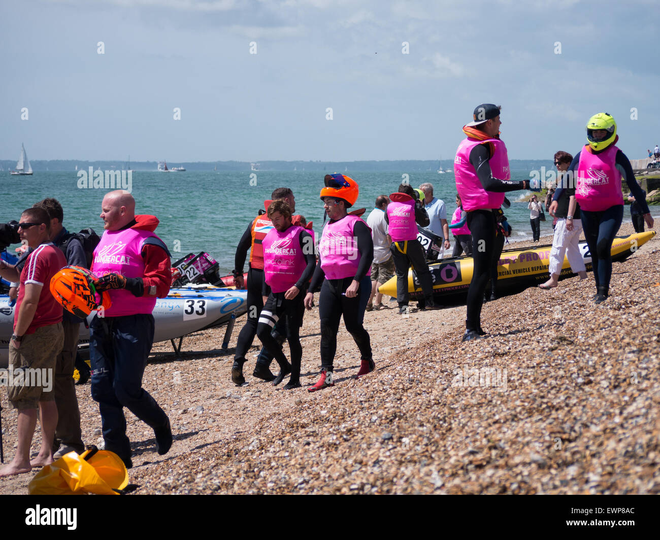 Boat crew make their way to their RIBs during a Thundercat powerboating