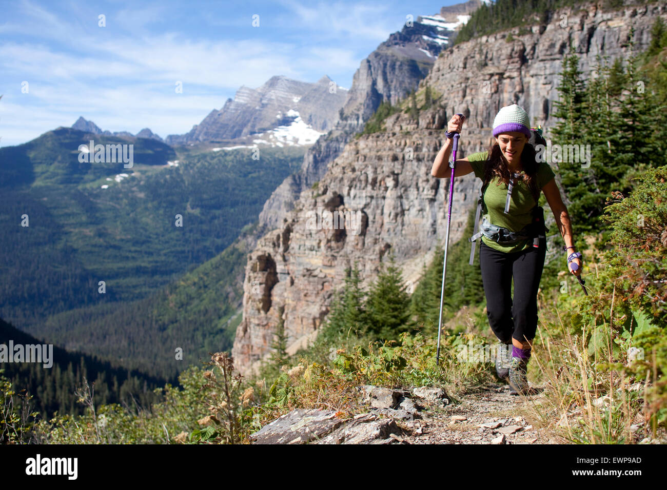 A woman hiking in the high country Stock Photo - Alamy