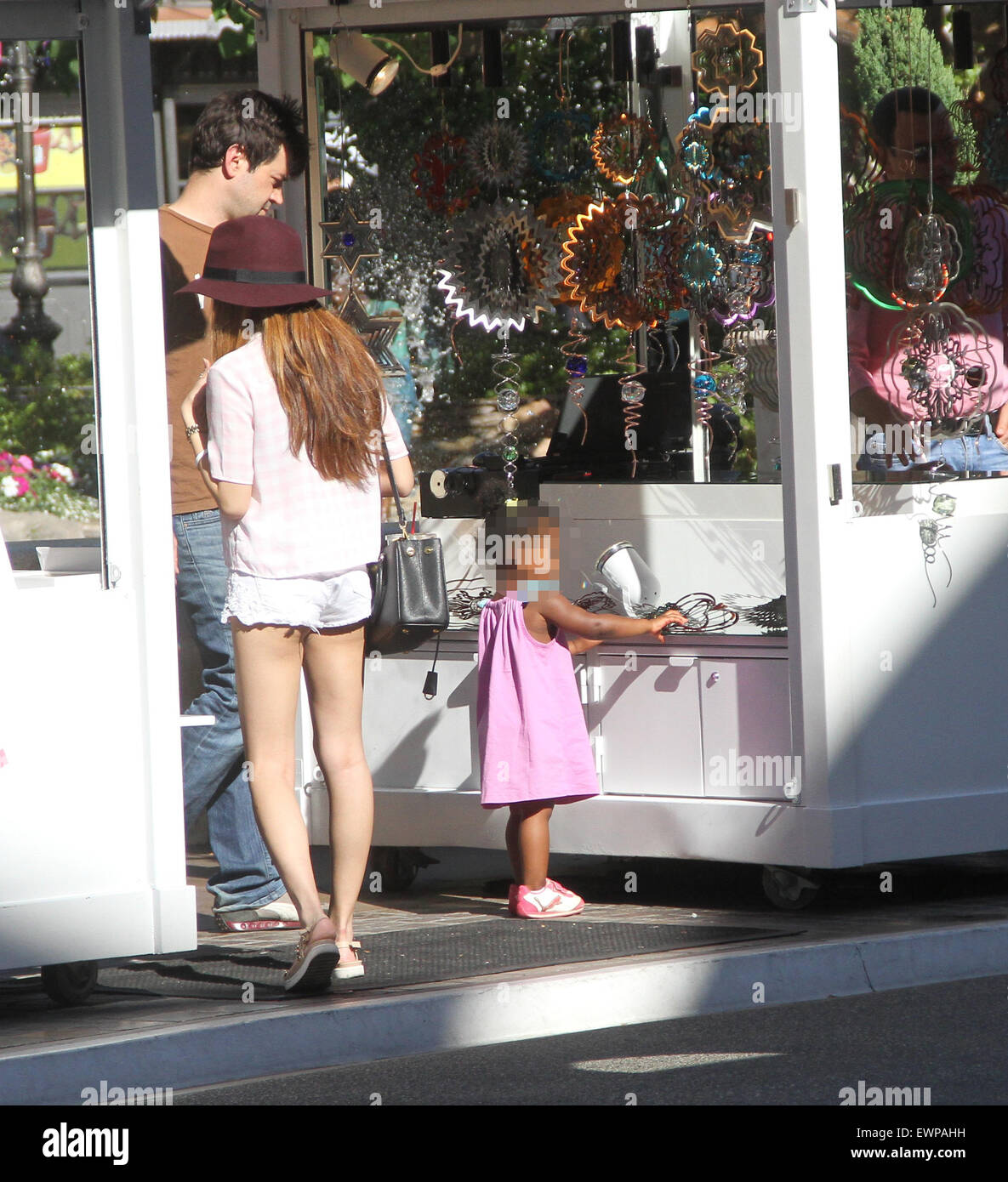 Ron Livingston takes his film actress wife Rosemarie DeWitt and their adopted daughter Gracie James shopping at The Grove in Hollywood  Featuring: Ron Livingston, Gracie James Livingston Where: Los Angeles, California, United States When: 27 Apr 2015 Stock Photo