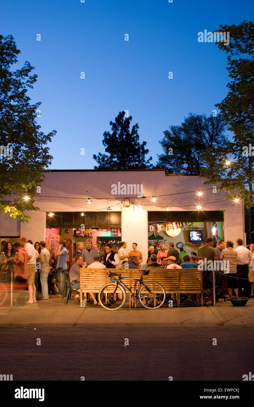 Nighttime party scene outside local bar in Boise Idaho Stock Photo Alamy