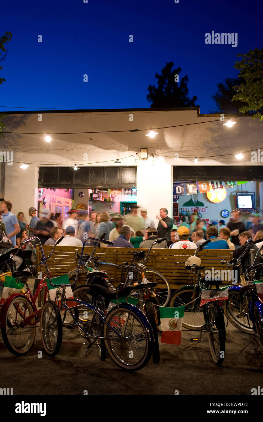 Nighttime party scene outside local bar in Boise Idaho Stock Photo Alamy
