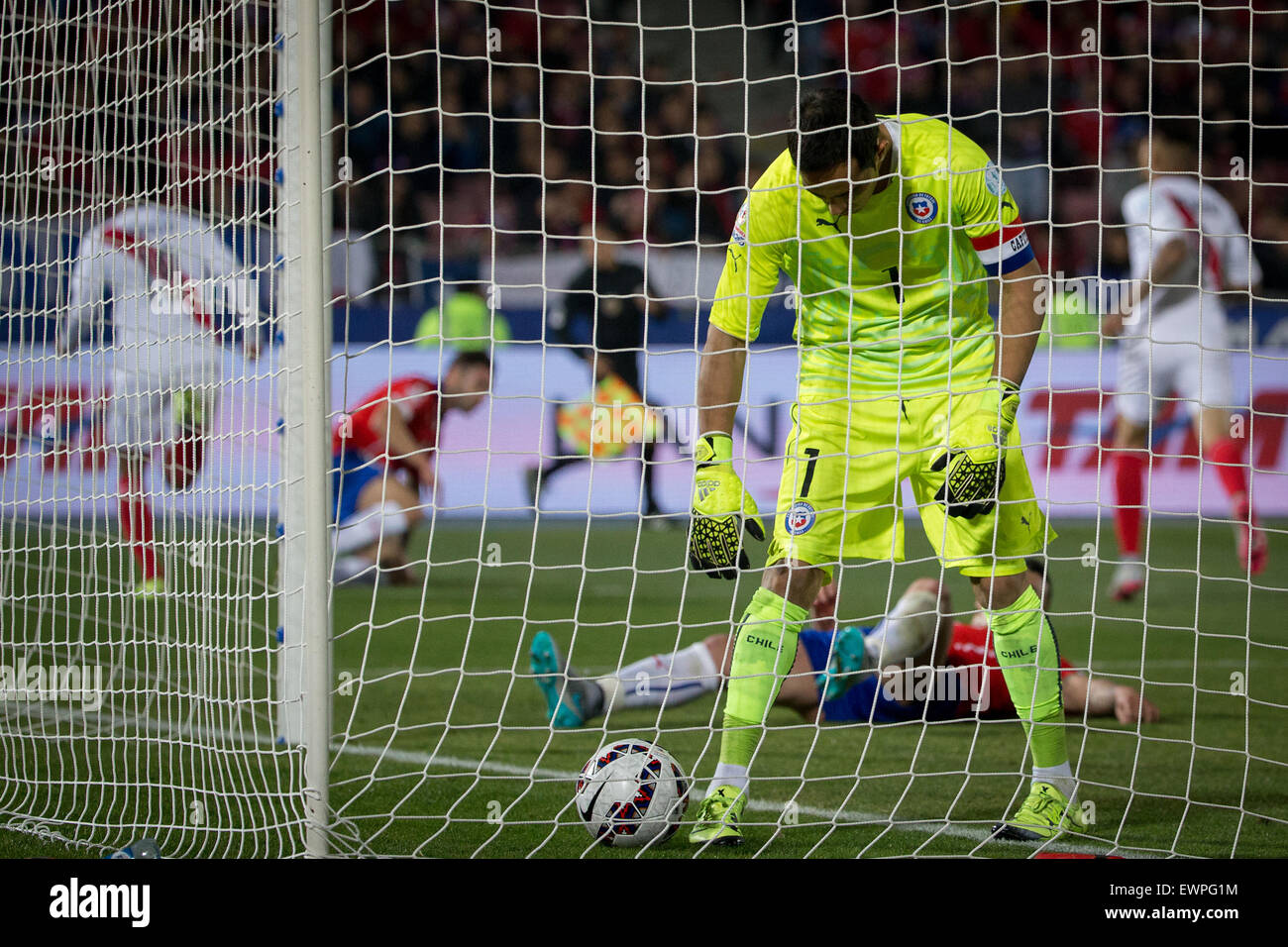 Santiago, Chile. 29th June, 2015. Goalie Claudio Bravo (Front) from Chile reacts after a goal from Peru during the Copa America Chile 2015 semifinal match, held at National Stadium, in Santiago, Chile, on June 29, 2015. Chile won 2-1 Credit:  Pedro Mera/Xinhua/Alamy Live News Stock Photo