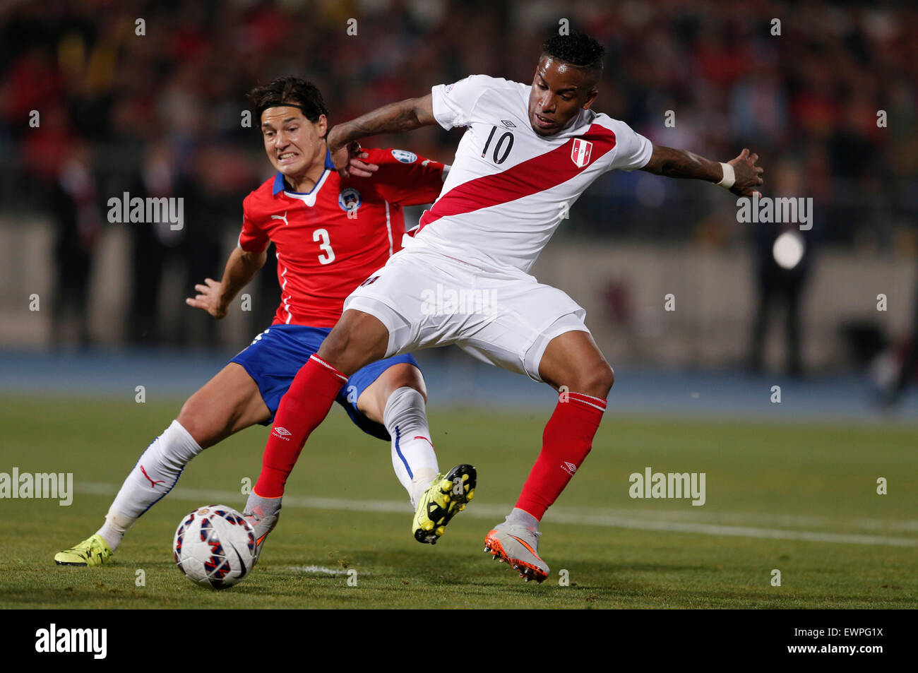 Santiago, Chile. 29th June, 2015. Miiko Albornoz (L) from Chile vies for the ball with Jefferson Farfan (R) from Peru during the Copa America Chile 2015 semifinal match, held at National Stadium, in Santiago, Chile, on June 29, 2015. Chile won 2-1 Credit:  Guillermo Arias/Xinhua/Alamy Live News Stock Photo
