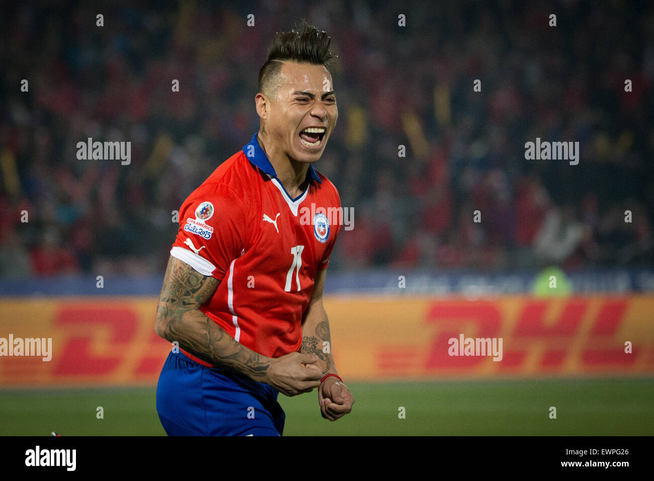 Santiago, Chile. 29th June, 2015. Eduardo Vargas from Chile celebrates scoring against Peru during the Copa America Chile 2015 semifinal match, held at National Stadium, in Santiago, Chile, on June 29, 2015. Chile won 2-1 Credit:  Pedro Mera/Xinhua/Alamy Live News Stock Photo