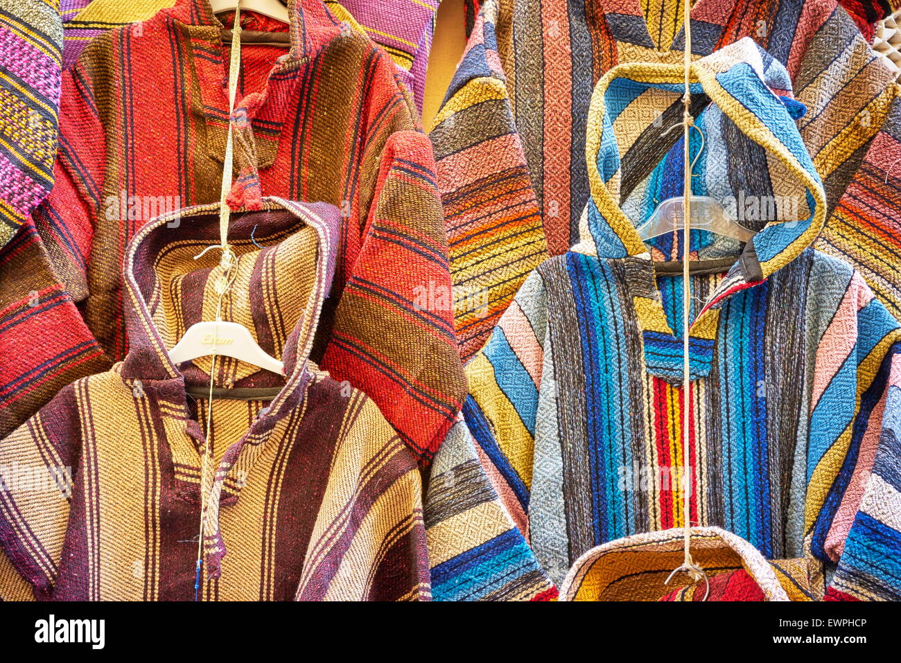 Clothing shop. Wool djellabas, Berber Moroccan traditional dress. Morocco Stock Photo