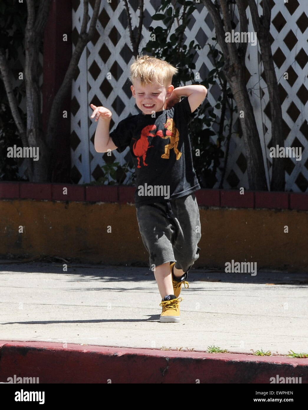 Hilary Duff still sporting her dyed hair, takes her son Luca to The Co-op in Studio City as he was cooled down on a hot spring day, getting sprinkled with bottled water by his nanny  Featuring: Luca Comrie Where: Los Angeles, California, United States When: 28 Apr 2015 C Stock Photo
