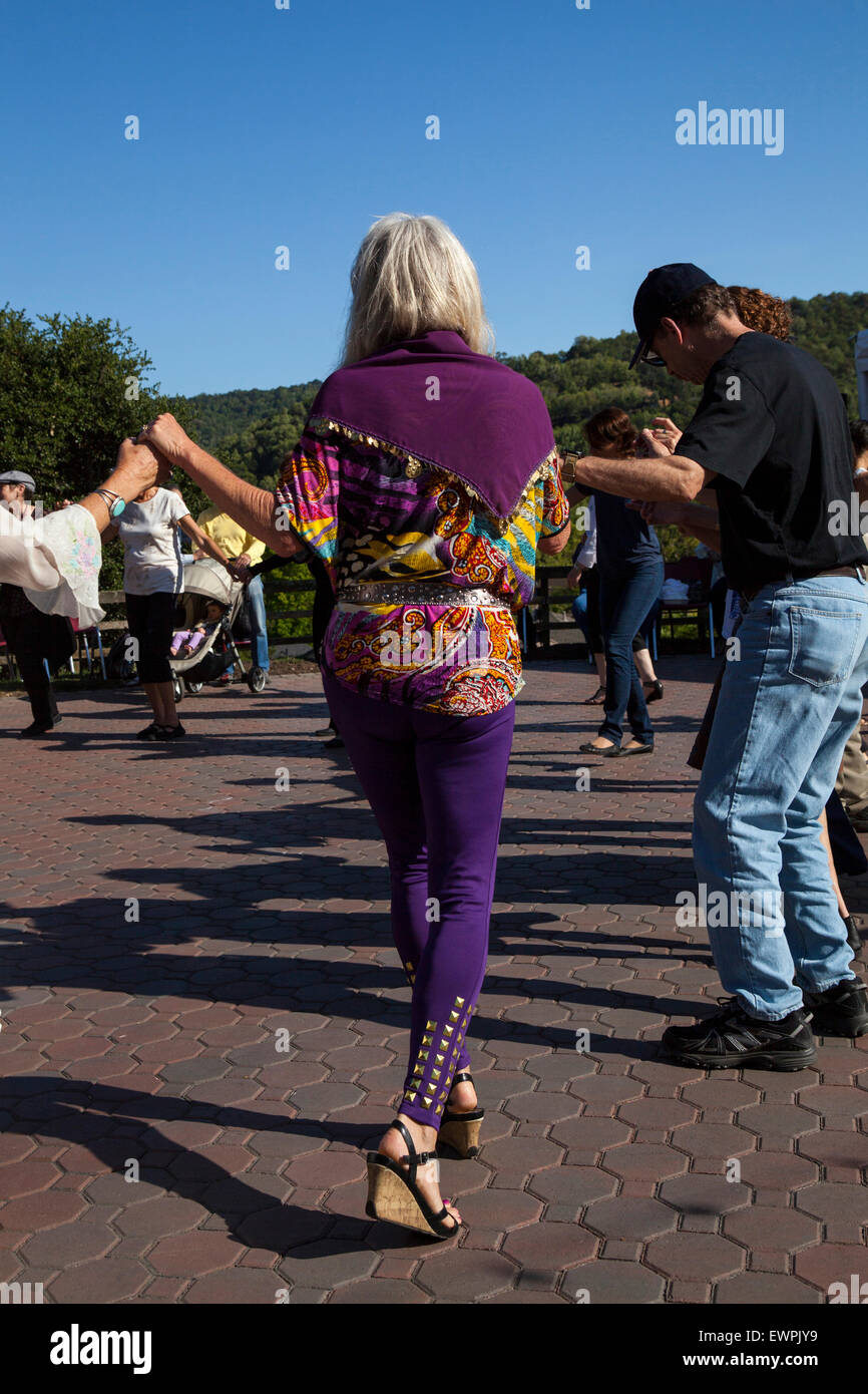 Woman participating in a Greek dance at a Greek Festival, Novato