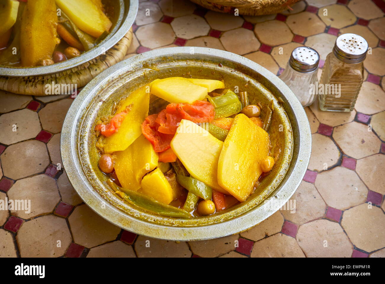 Traditional moroccan food tagine tajine served in restaurant on Djemaa el-Fna Square, Marrakesh, Morocco Stock Photo