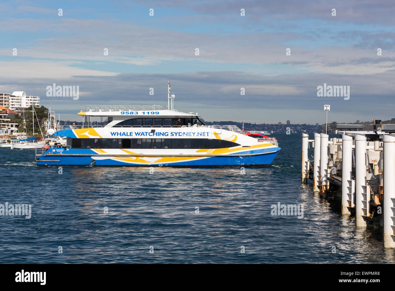 Manly, Australia-June 5th 2015: The high speed ferry turning to depart Manly Wharf. Stock Photo