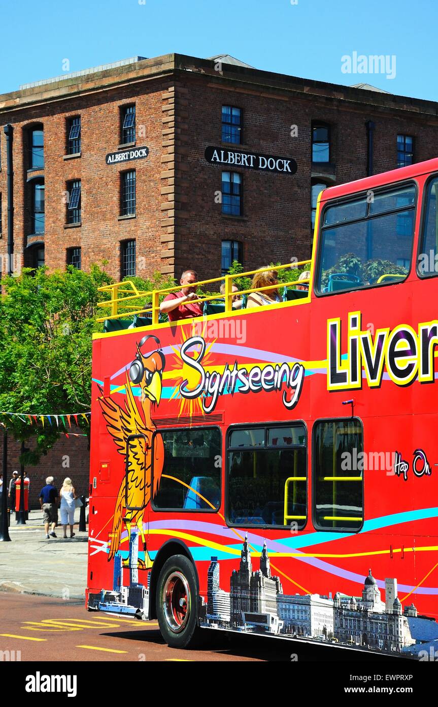 Red tour bus outside Albert Dock, Liverpool, Merseyside, England, UK ...