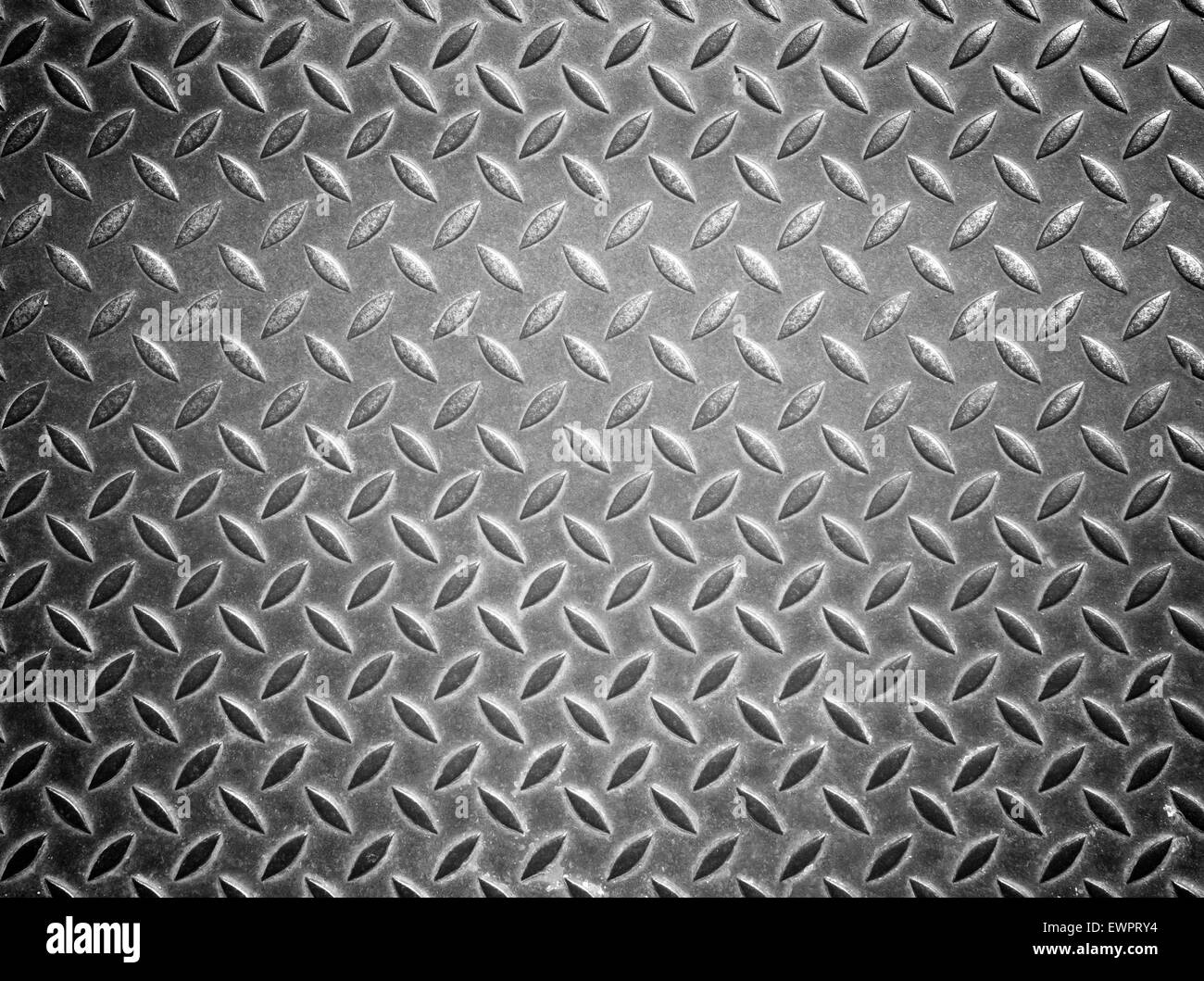 Background of metal diamond plate in silver color. Stock Photo