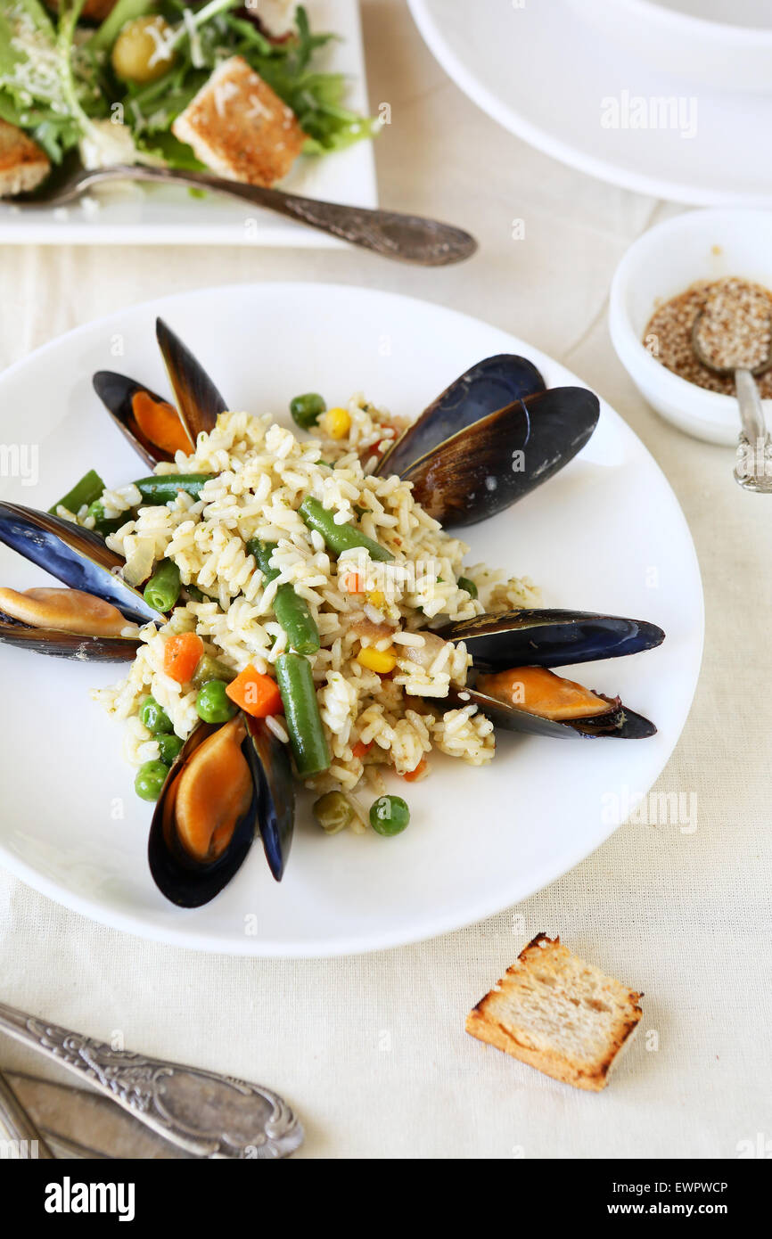Vegetable risotto with mussels, food closeup Stock Photo Alamy