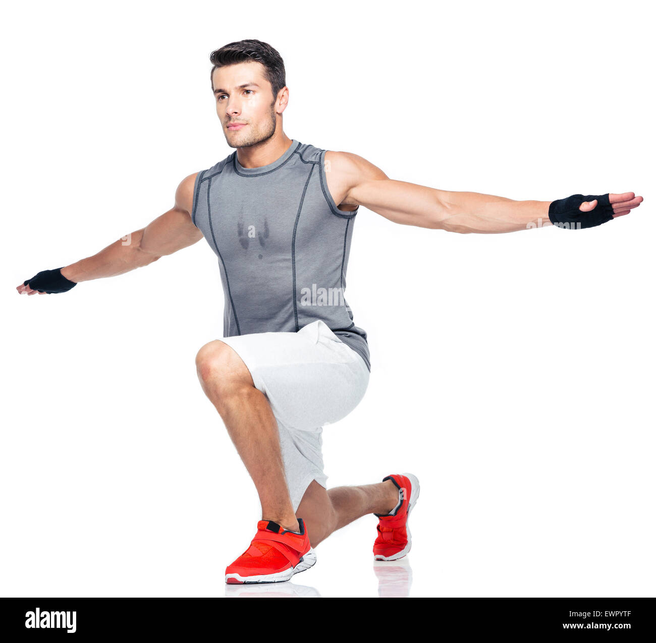 Full length portrait of a sports man stretching isolated on a white background Stock Photo Alamy