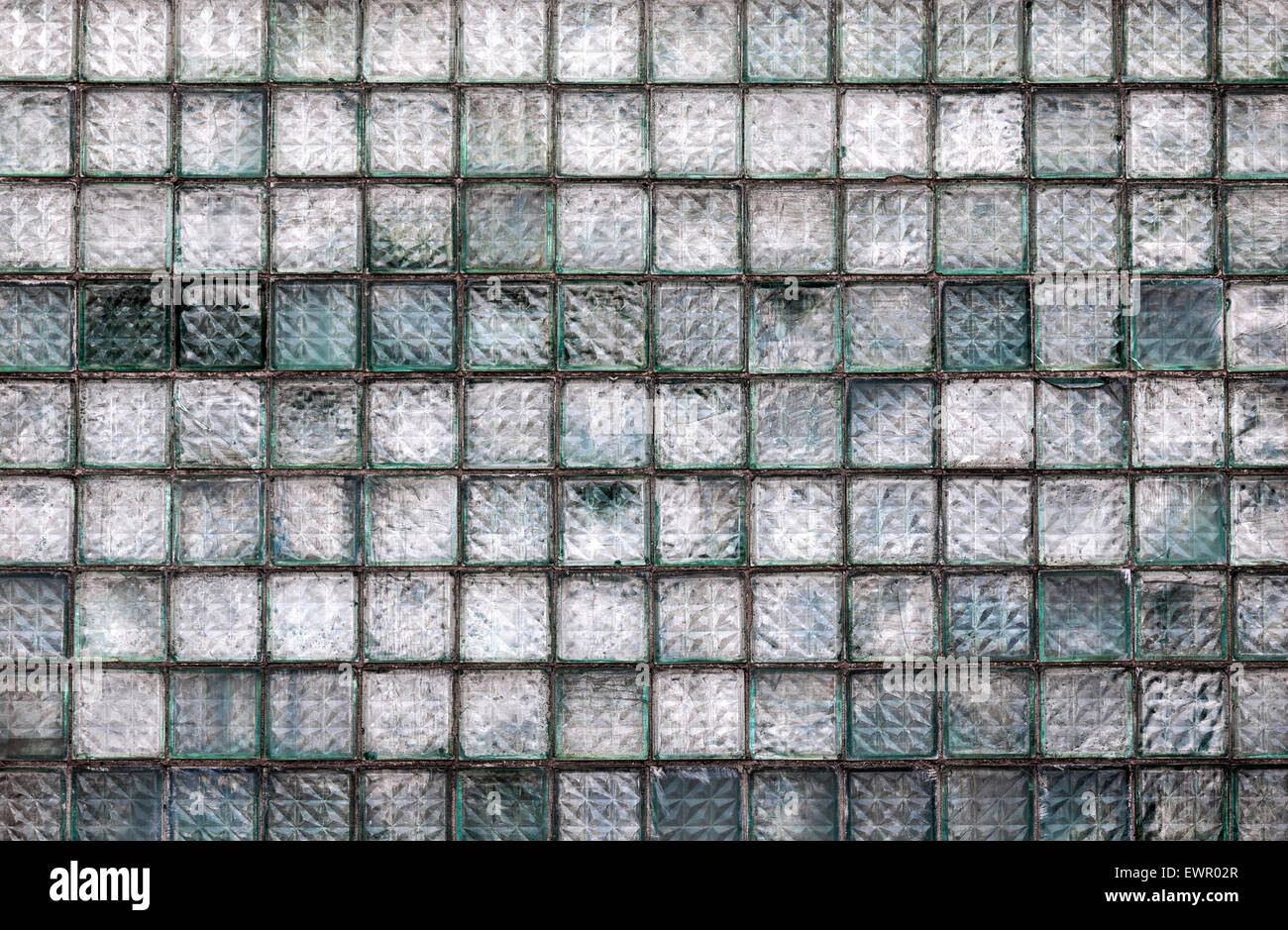 Old weathered glass block wall background Stock Photo