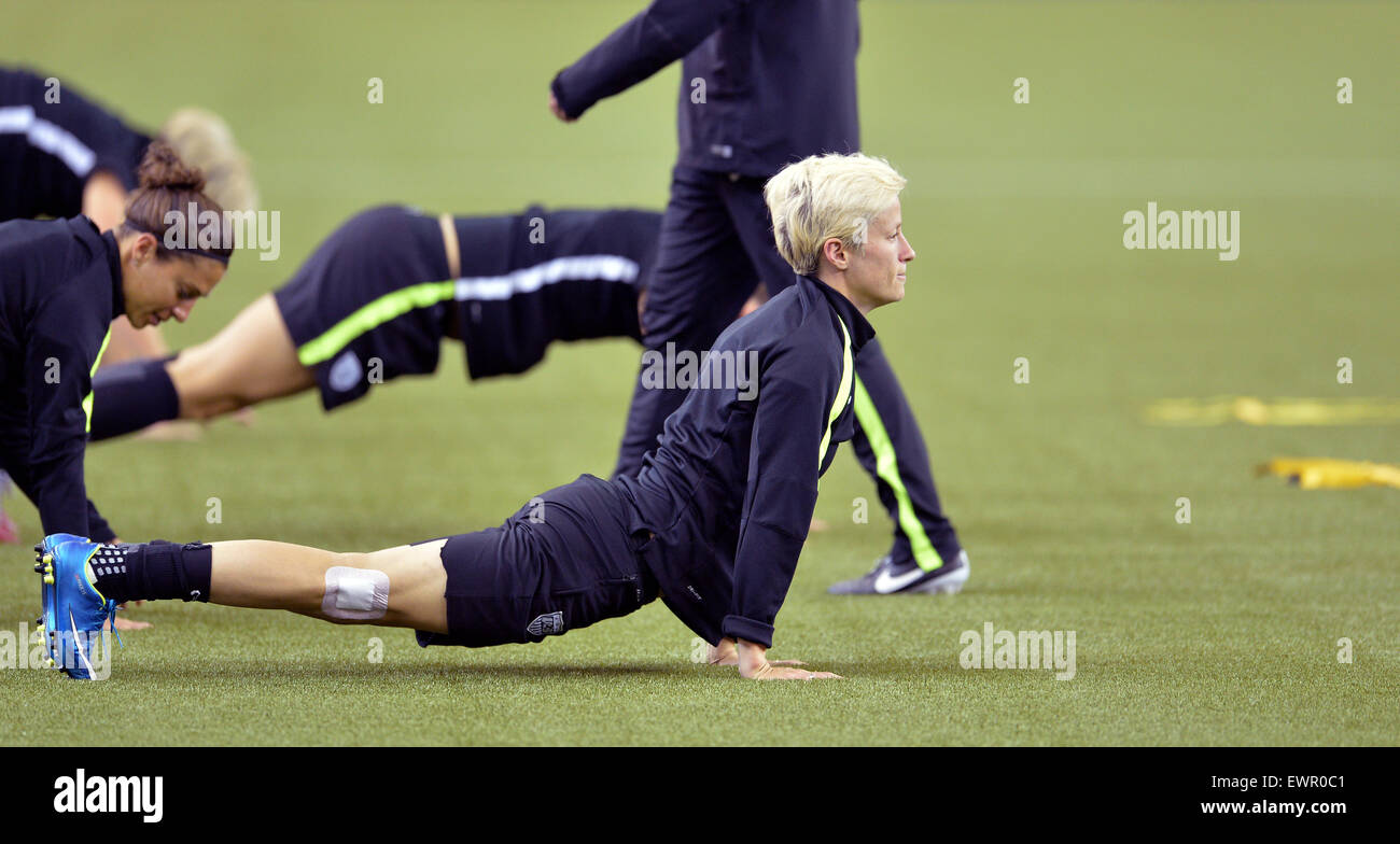 US player Megan Rapino stretches during a training session at the Stade de Olympique in Montreal during the FIFA Women's World Cup in Canada, 30 June 2015. Photo: CARMEN JASPERSEN/dpa Stock Photo