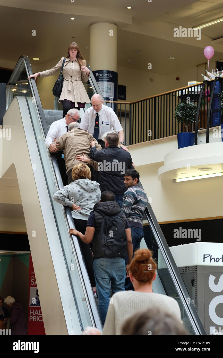 Accident on escalator in shopping center Stock Photo Alamy
