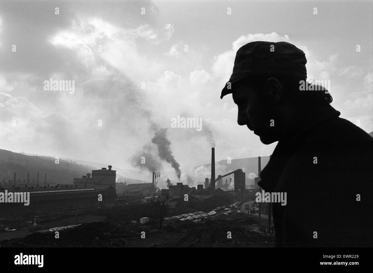 Ebbw Vale, Wales. Welsh steelworker makes his way home from the British Steelworks of Ebbw Vale, 11th March 1971. Face of Britain 1971 Feature. Stock Photo